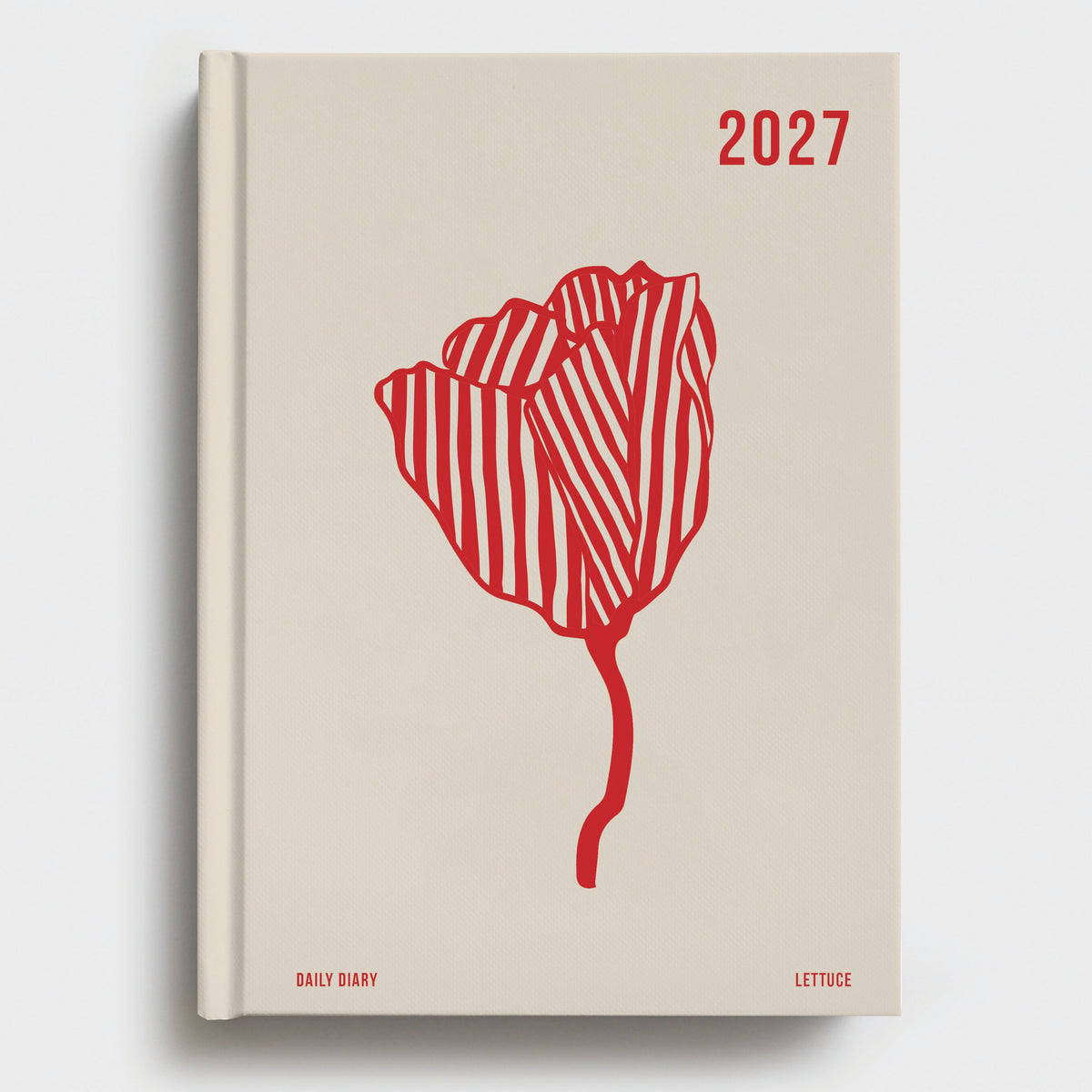 Beige diary with red floral design and '2027' on a white background