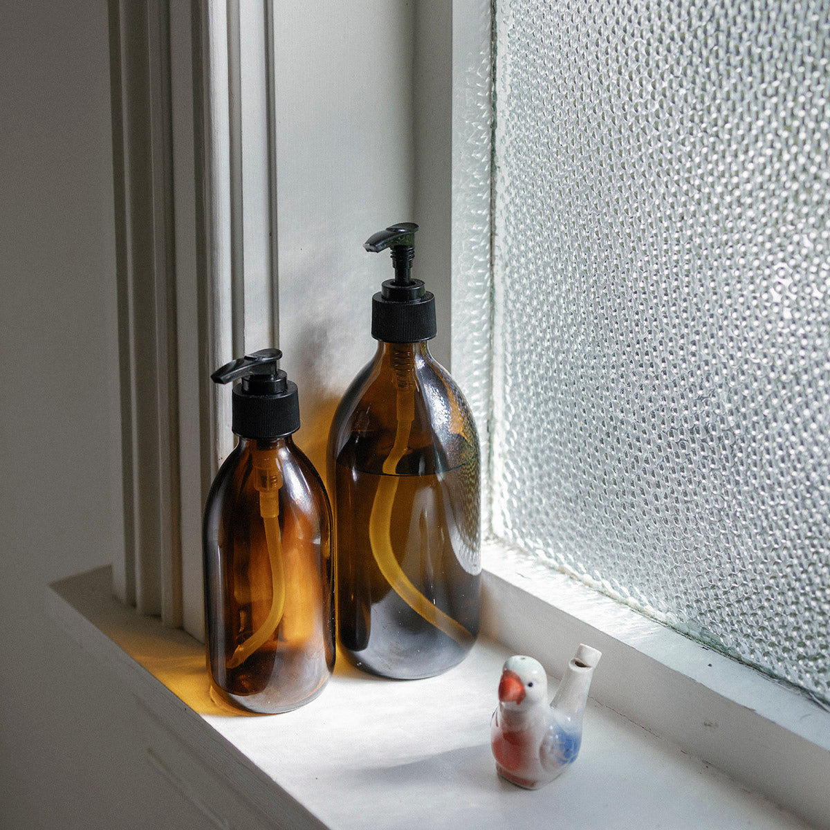 AMBER GLASS PUMP BOTTLES