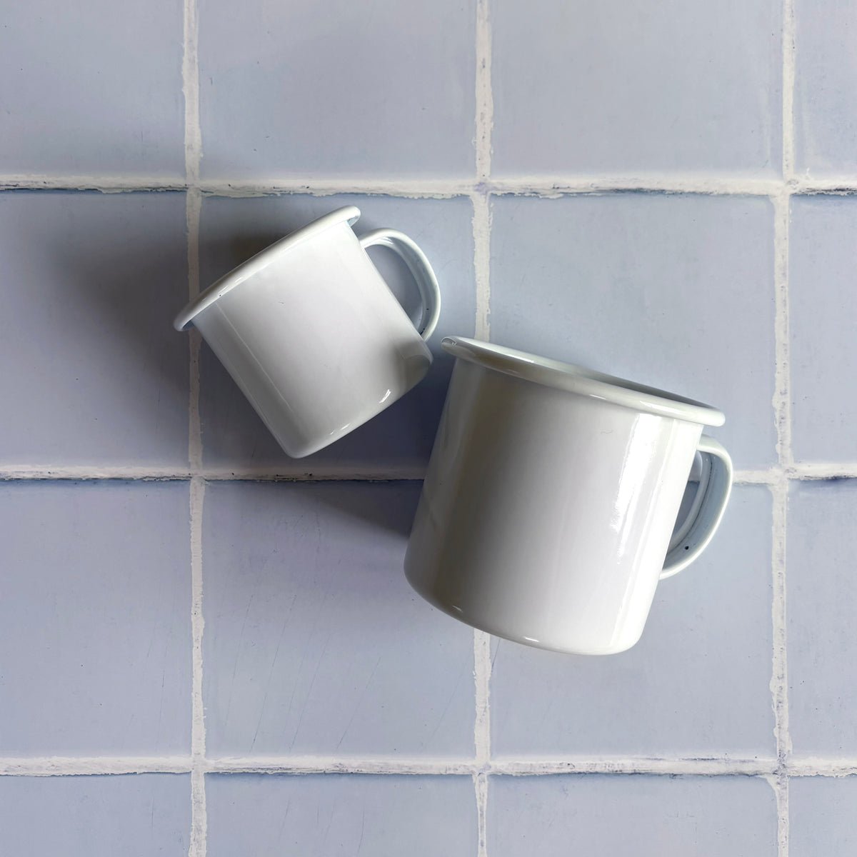 camping mugs in white enamel