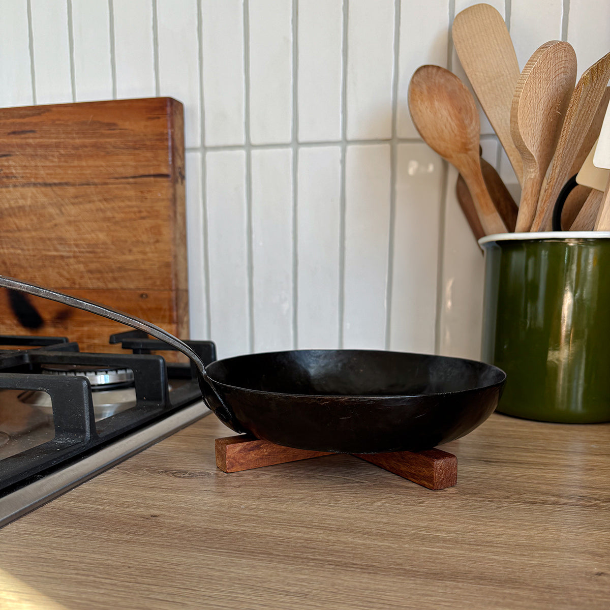 handcrafted wooden trivet made from rimu that collapses down for easy storage