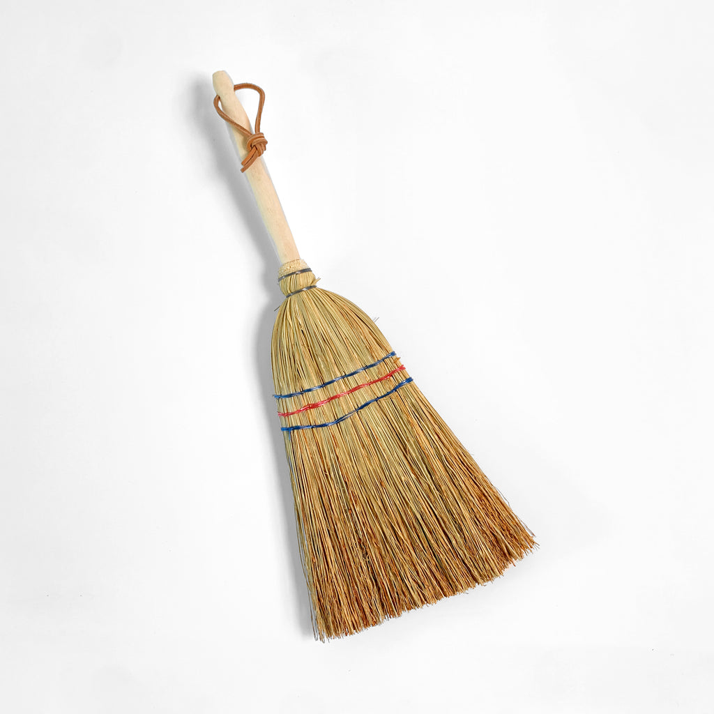 Straw hand broom with wooden handle